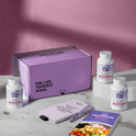 A hand holding a golden supplement capsule against a light gray background. Pink and purple headline text reads 'Reignite Desire by 348%, Boost Libido, Energy & Pleasure in Weeks.' A purple circular badge reads 'How to Use: Take 3 capsules morning or night to ignite your energy.'
