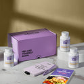 A product bundle display for GleeFull Supplements on a marble surface against a yellow background. The layout includes a large purple shipping box featuring the slogan 'FEEL LIKE YOURSELF AGAIN.', three white bottles of Cool REM Sleep, a purple branded pen, a matching notepad that reads 'REMINDERS WHEN I'M HAVING A MENOPAUSE MOMENT', and a recipe booklet titled 'THE MENOPAUSE Recipes'