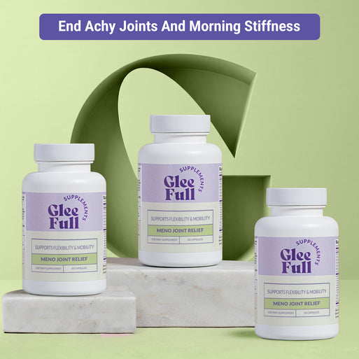 Three white GleeFull Meno Joint Relief bottles on marble blocks against a green background. Purple banner reads: 'End Achy Joints And Morning Stiffness'. Labels read 'Supports Flexibility & Mobility, Meno Joint Relief, 60 Capsules'.