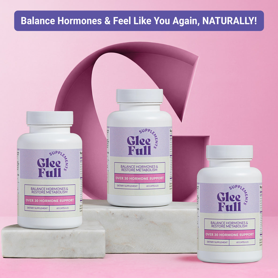 Product display for GleeFull Over 30 Hormone Support dietary supplements. A top banner reads: Balance Hormones & Feel Like You Again, NATURALLY! Three white bottles are shown arranged on marble steps against a pink background with a large letter G graphic.
