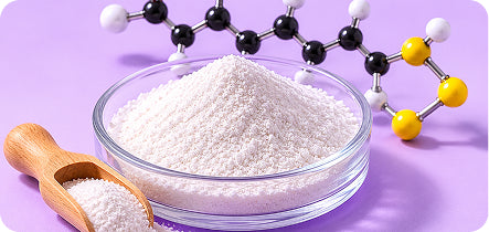 White powder in a glass bowl with a wooden scoop on a purple background, featuring a molecular structure diagram.